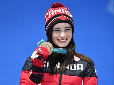 Canada's bronze medallist Kaetlyn Osmond poses on the podium during the medal ceremony for the figure skating women's singles at the Pyeongchang Medals Plaza during the Pyeongchang 2018 Winter Olympic Games in Pyeongchang on February 23, 2018.