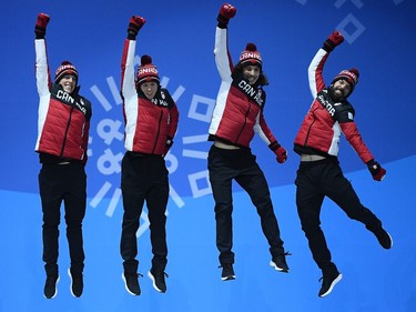 Bronze medalists Samuel Girard, Charles Hamelin, Charle Cournoyer and Pascal Dion of Canada celebrate during the medal ceremony for Short Track Speed Skating - Men's 5,000m Relay on day 14 of the PyeongChang 2018 Winter Olympic Games at Medal Plaza on February 23, 2018 in Pyeongchang-gun, South Korea.