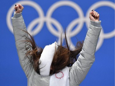 Russia's gold medallist Alina Zagitova jumps on the podium during the medal ceremony for the figure skating women's singles at the Pyeongchang Medals Plaza during the Pyeongchang 2018 Winter Olympic Games in Pyeongchang on February 23, 2018.