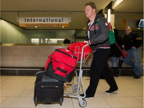 Cody Sorensen arrives back at the Ottawa airport after competing in the Sochi Winter Olympics in February 2014.