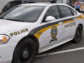 A Surete du Quebec police car is shown in Levis, Que., Friday, October 12, 2012. Quebec provincial police have identified the police officer who was fatally shot in the line of duty in Lac-Simon on Saturday night as 26-year-old Thierry Leroux. THE CANADIAN PRESS/Jacques Boissinot