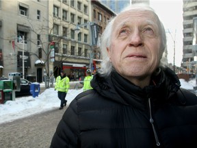 Cyril Winter, a 70-year-old protester opposed to abortion who's spent the better part of the past six years standing outside Ottawa's Morgentaler Clinic wearing large graphic sandwich boards, walks anonymously Thursday inside the new 'bubble zone.'