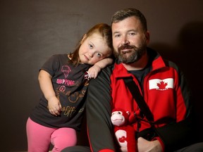 An Ottawa strip club is hosting an upcoming 'dwarf toss event', which David Zito isn't happy about. His youngest daughter, Jaxine, 6, has dwarfism and he thinks such an event is demeaning to little people everywhere.  Julie Oliver/Postmedia