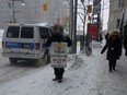 February 7, 2015 Protester on Bank St. just outside The Morgentaler Clinic. (Photo by Amanda Carver)