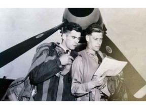 John Jefferson, left, with unidentified man during gunnery practice.