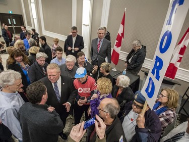 Ontario PC leadership candidate, Doug Ford, meets with supporters after speaking at a rally at the Infinity Convention Centre in Ottawa Monday, February 19, 2018 (Photo/Darren Brown)