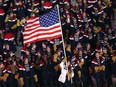 Flag bearer Erin Hamlin of the United States leads the team during the Opening Ceremony of the PyeongChang 2018 Winter Olympic Games on Feb. 9.