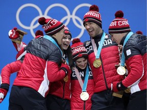 Gold medalists Team Canada celebrate during the medal ceremony after the Figure Skating Team Event at Medal Plaza on February 12, 2018 in Pyeongchang-gun, South Korea.