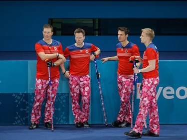 Norwegian curling team members, left to right, Christoffer Svae, Torger Nergard, Thomas Ulsrud and Havard Vad Petersson look particularly dashing on St. Valentine's Day during Olympic curling competition in South Korea.