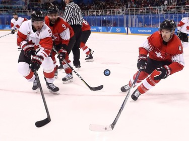 Derek Roy #9 of Canada controls the puck against Patrick Geering #4 of Switzerland during the Men's Ice Hockey Preliminary Round Group A game on day six of the PyeongChang 2018 Winter Olympic Games at Kwandong Hockey Centre on February 15, 2018 in Gangneung, South Korea.