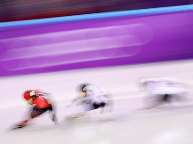 Samuel Girard of Canada, Yira Seo of Korea, John-Henry Krueger of the United States compete during the Short Track Speed Skating Men's 1000m Final A on day eight of the PyeongChang 2018 Winter Olympic Games at Gangneung Ice Arena on February 17, 2018 in Gangneung, South Korea.