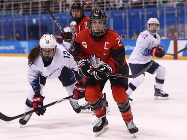 Marie-Philip Poulin #29 of Canada skates for the puck during the Women's Ice Hockey Preliminary Round Group A game on day six of the PyeongChang 2018 Winter Olympic Games at Kwandong Hockey Centre on February 15, 2018 in Gangneung, South Korea.