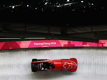 Christopher Spring and Lascelles Brown of Canada slides during two-man Bobsleigh heats on day nine of the PyeongChang 2018 Winter Olympic Games at Olympic Sliding Centre on February 18, 2018 in Pyeongchang-gun, South Korea.