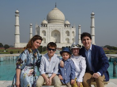 Prime Minister of Canada Justin Trudeau, his wife Sophie Gregoire and his children pose for a photograph during their visit to Taj Mahal in Agra on February 18, 2018. Trudeau and his family arrived at the Taj Mahal on February 18, kickstarting their week-long trip to India aimed at boosting economic ties between the two countries.