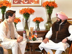 In this photograph released by the Amritsar District Public Relations Officer on February 21, 2018, Canadian Prime Minister Justin Trudeau (L) meets with Punjab Chief Minister Amarinder Singh in Amritsar.