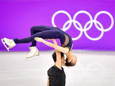 Ryom Tae Ok (top) and Kim Ju Sik of North Korea practise at the Gangneung Ice Arena, ahead of the pairs figure skating competition of the Pyeongchang 2018 Winter Olympic Games, in Gangneung on February 8, 2018.