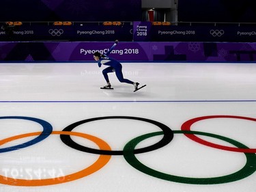 An athlete practices during a speed skating training session at the Gangneung Oval Arena during the 2018 Pyeongchang Winter Olympic Games in Gangneung on February 8, 2018.