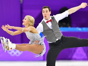 Germany's Aljona Savchenko (L) and Germany's Bruno Massot compete in the figure skating team event pair skating short program during the Pyeongchang 2018 Winter Olympic Games at the Gangneung Ice Arena in Gangneung on February 9, 2018.