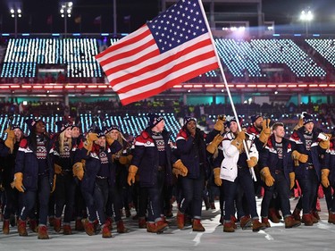 USA's delegation and flagbearer Erin Hamlin parade during the opening ceremony of the Pyeongchang 2018 Winter Olympic Games at the Pyeongchang Stadium on February 9, 2018.