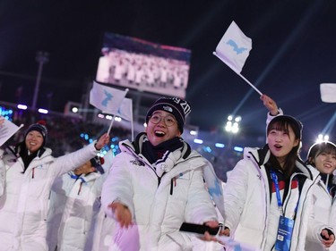 Unified Korea's athletes parade during the opening ceremony of the Pyeongchang 2018 Winter Olympic Games at the Pyeongchang Stadium on February 9, 2018.