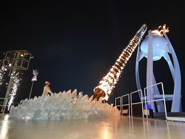 South Korean figure skater Kim Yu-na lights the cauldron with the Olympic Flame during the opening ceremony of the Pyeongchang 2018 Winter Olympic Games at the Pyeongchang Stadium on February 9, 2018.