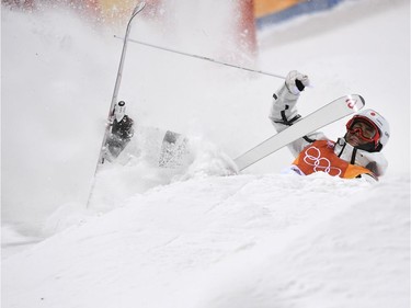 Japan's Ikuma Horishima falls in the men's moguls final 1 during the Pyeongchang 2018 Winter Olympic Games at the Phoenix Park in Pyeongchang on February 12, 2018.