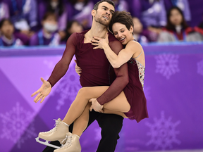 Canada's Meagan Duhamel and Canada's Eric Radford compete in the pair skating free skating.