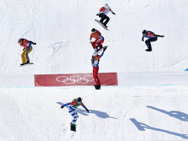 Italy's Michela Moioli leads the pack to win the women's snowboard cross event at the Phoenix Park during the Pyeongchang 2018 Winter Olympic Games on February 16, 2018 in Pyeongchang.