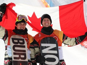 Mark McMorris and Max Parrot, right, celebrate their bronze and silver medals in the men's slopestyle final on Sunday. They were Canada's first medals of the 2018 Winter Games.