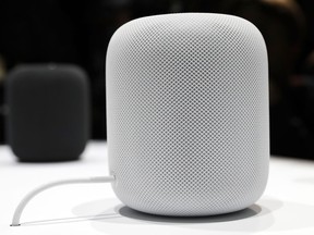 FILE - This June 5, 2017, file photo shows the HomePod speaker in a showroom during an announcement of new products at the Apple Worldwide Developers Conference in San Jose, Calif. Apple's new internet-connected speaker is proving to be more appealing to the ears than to the eyes, depending on where the device is placed. Some people who bought the just-released $349 speaker, dubbed the HomePod, are reporting that it leaves a white ring on the surfaces of wooden furniture. In an explanation posted Wednesday, Feb. 14, 2018, Apple said the problem occurs with speakers that, like the HomePod, are equipped with a silicon base to minimize vibration.