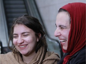 Reyenne Annous (L) and Jolly Bimbachi (R) reuniting at the Ottawa airport. February 8, 2018. Photo: Kieran Delamont