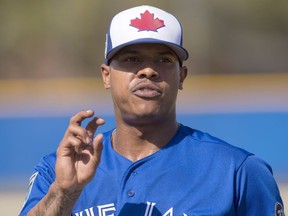 Toronto Blue Jays pitcher Marcus Stroman gestures at the end of a live batting practice session on Feb. 21. Stroman's spring training debut has been delayed because of right shoulder inflammation.