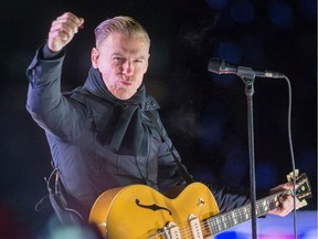 Bryan Adams entertains following the second period as the Ottawa Senators take on the Montreal Canadiens in the Dec. 16, 2017 Scotiabank NHL 100 Classic outdoor hockey game at TD Place in Ottawa.