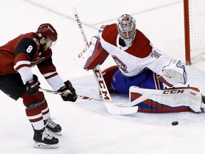 Montreal Canadiens goaltender Carey Price (31) makes a save on a shot by Arizona Coyotes right wing Tobias Rieder (8) on Feb. 15, 2018, in Glendale, Ariz.