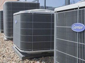 Air conditioners are shown in Omaha, Neb., in a Tuesday, April 21, 2009 file photo. the days of answering your doorbell to find someone hawking duct-cleaning services or a new furnace will be over for Ontarians when a new law comes into effect on Thursday, but it won't stop telecommunications companies, home maintenance services or charities from knocking on doors.