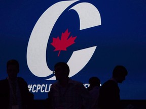 Supporters take their seats during the opening night of the federal Conservative leadership convention in Toronto on Friday, May 26, 2017. An annual gathering of Canadian conservatives begins in Ottawa Thursday night at a time when the movement is being rocked by allegations of sexual misconduct against some of its leaders and questions about how others have handled those allegations.