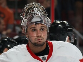 Petr Mrazek (34) of the Detroit Red Wings pauses after giving up a goal to the Philadelphia Flyers in an NHL game at the Wells Fargo Center on March 15, 2016, in Philadelphia, Pa.