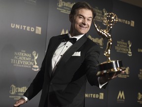 Dr. Mehmet Oz, winner of the award for outstanding informative talk show for "The Dr. Oz Show," poses in the press room at the 44th annual Daytime Emmy Awards at the Pasadena Civic Center on Sunday, April 30, 2017, in Pasadena, Calif. (Richard Shotwell/Invision/AP)