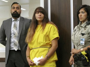 FILE - In this July 28, 2017 file photo, Obdulia Sanchez appears in a Los Banos, Calif., branch of the Merced County Superior Court with her public defender, Ramnik Samrao, left. Sanchez has been sentenced to six year and four months in prison for driving drunk while livestreaming the crash that killed her younger sister.