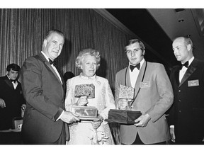 In this Jan. 22, 1971, file photo, Vice President Spiro Agnew, left, presents the first Lombardi Award to Ohio State defensive tackle Jim Stillwagon, second from right, in Houston. Stillwagon, who helped Ohio State win two U.S. college football titles before playing five seasons with the CFL's Toronto Argonauts, has died at the age of 68.