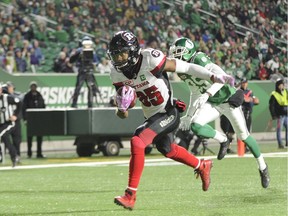 Redblacks wide receiver Diontae Spencer (85) scores a touchdown during the first half of a game against the Roughriders at Regina on Oct. 13.