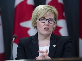 Carla Qualtrough, Minister of Public Services and Procurement, speaks at an announcement on fighter jets at the National Press Theatre in Ottawa on Tuesday, Dec. 12, 2017.