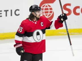 Senators defenceman Erik Karlsson celebrates his game-winning goal in overtime against the Ducks on Feb. 1.