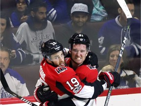 Senators centre Derick Brassard (19) celebrates with winger Mark Stone after scoring a goal against the Maple Leafs in a game on Oct. 21.