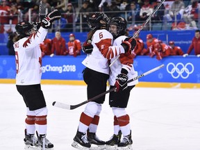Team Canada celebrates a goal against the Olympic Athletes from Russia on Feb. 19.