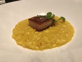 Pork belly with saffron risotto at Maison Boulud during the 2018 Montreal En Lumiere Festival