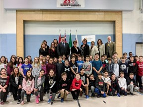 Students at Bernard-Grandmaître French Catholic School gathered on Thursday for an announcement that the province will pay $10.5 million to build a new elementary school in Riverside South that will take some of the pressure off Bernard-Grandmaître, which is full. Handout photo