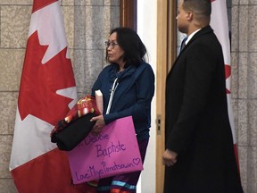 Debbie Baptiste, mother of Colten Boushie, leaves Prime Minister Justin Trudeau's office after a meeting on Parliament Hill in Ottawa on Tuesday, Feb. 13, 2018.