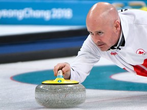Canada's Kevin Koe delivers a stone during the Pyeongchang Olympics on Feb. 15, 2018.