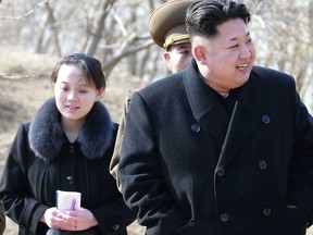 FILE - This 2015, file photo provided by the North Korean government shows North Korean leader Kim Jong Un and his sister Kim Yo Jong, left, during their visit to a military unit in North Korea. South Korea's Unification Ministry said North Korea informed Wednesday, Feb. 7, 2018, that Kim Yo Jong would be part of the high-level delegation coming to the South for the Pyeongchang Winter Olympics.